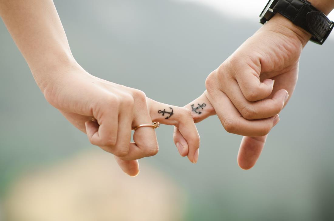 man and woman anchor tattoo