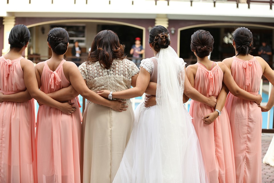bridesmaids with bride back view, peach bridesmaids dresses