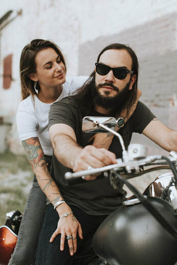 couple on a motorbike