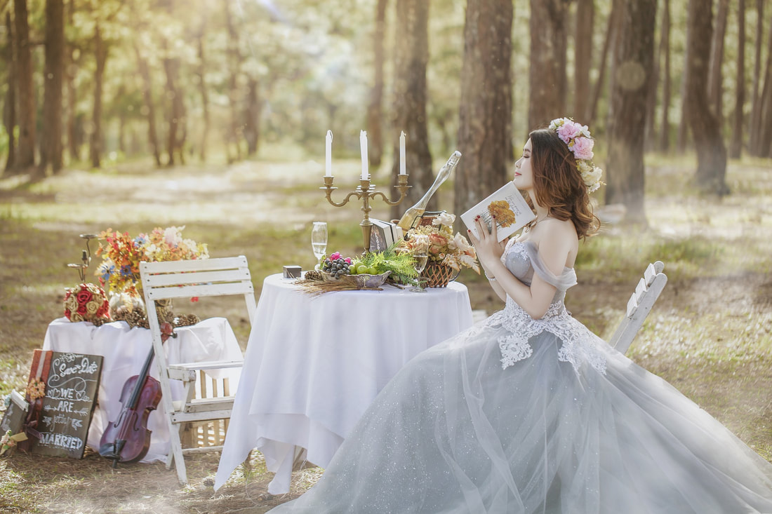 woman in wedding dress in forest